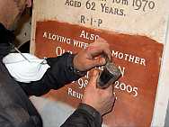 Hand Cutting the Inscription to Match the Existing Hand Cutting the Inscription to Match the Existing